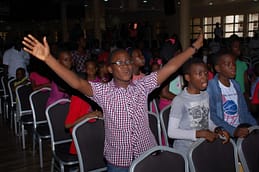 Children joins in praising and worshiping God