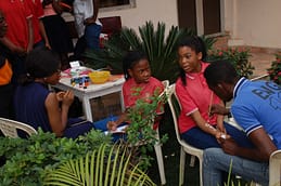 Excited participants getting their face and arm painted