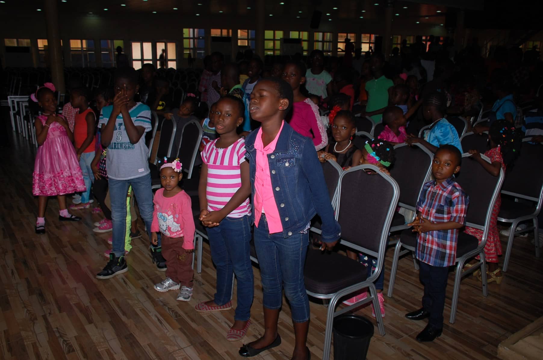Children joins in praising and worshiping God