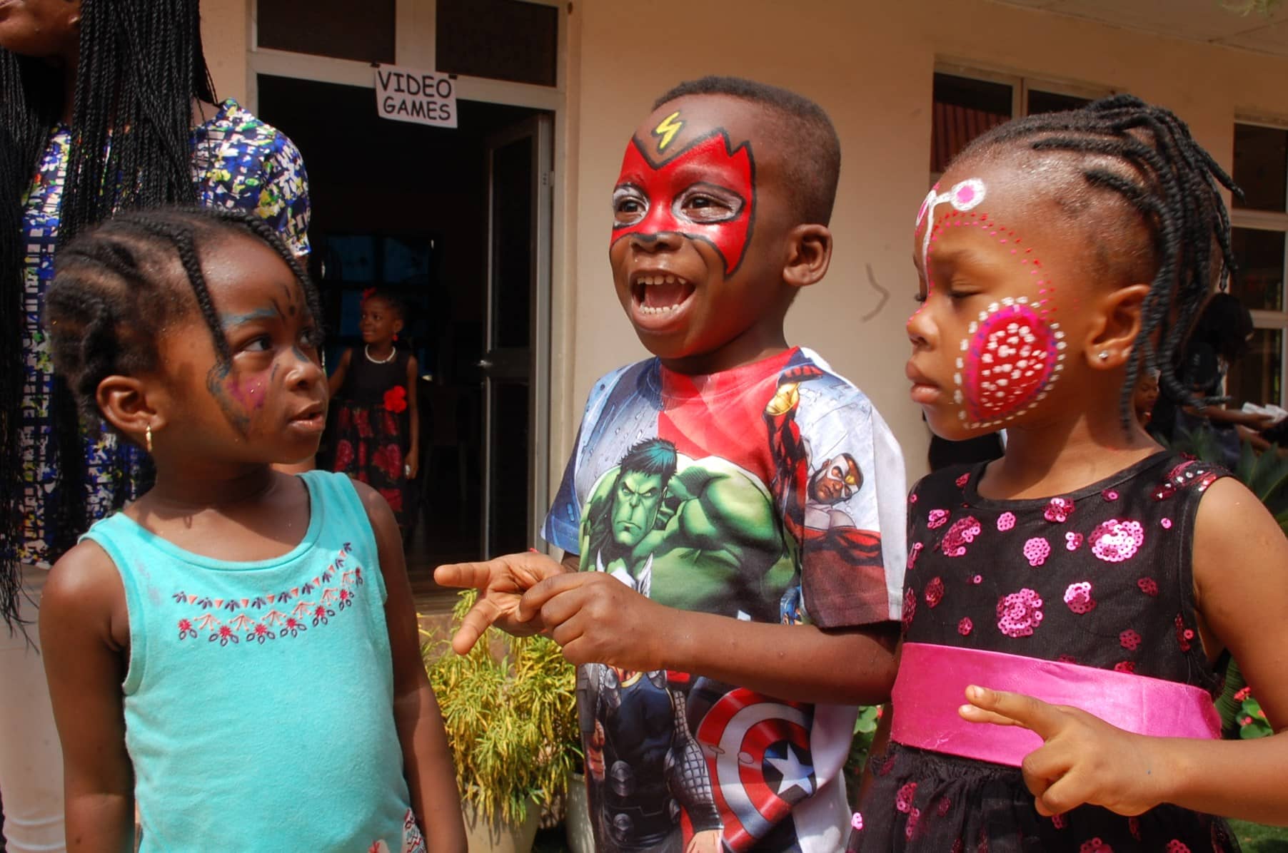 Excited children showed off their beautifully painted faces